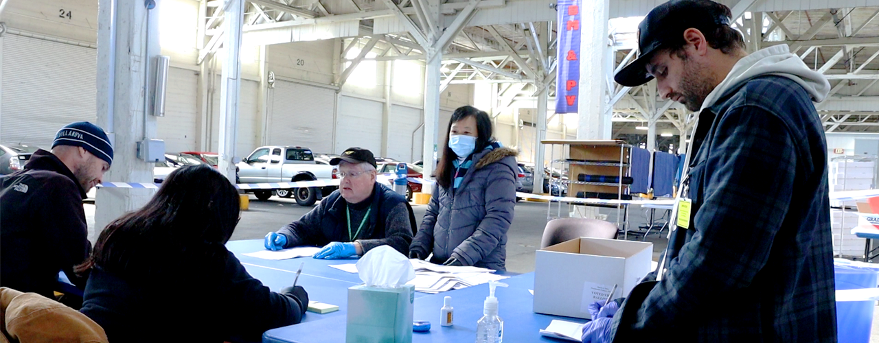 A team of election personnel conducting the 1% Tally
