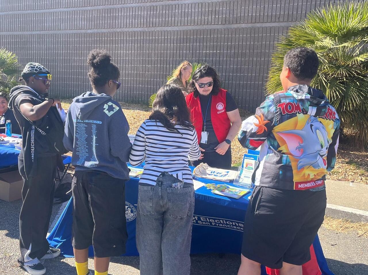 Photo of Elections staff conducting a resource table during National Night Out.