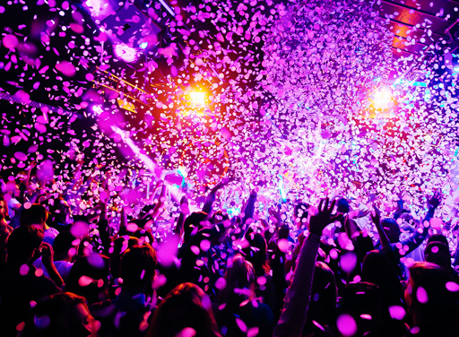 Photo of crowd at a concert with confetti