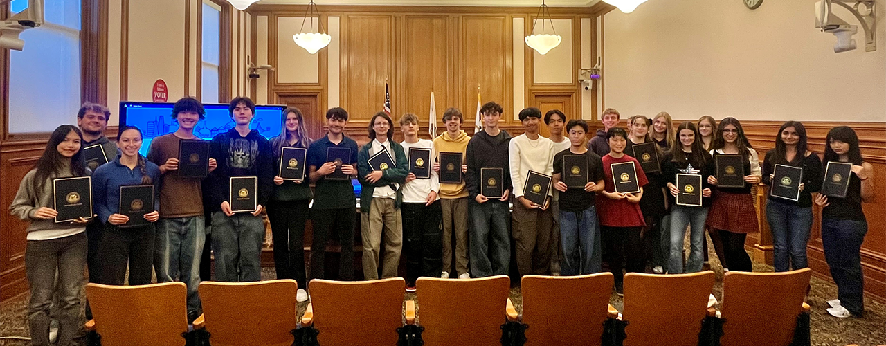 Group photo of high school elections ambassadors receiving their participation certificates at SF City Hall.