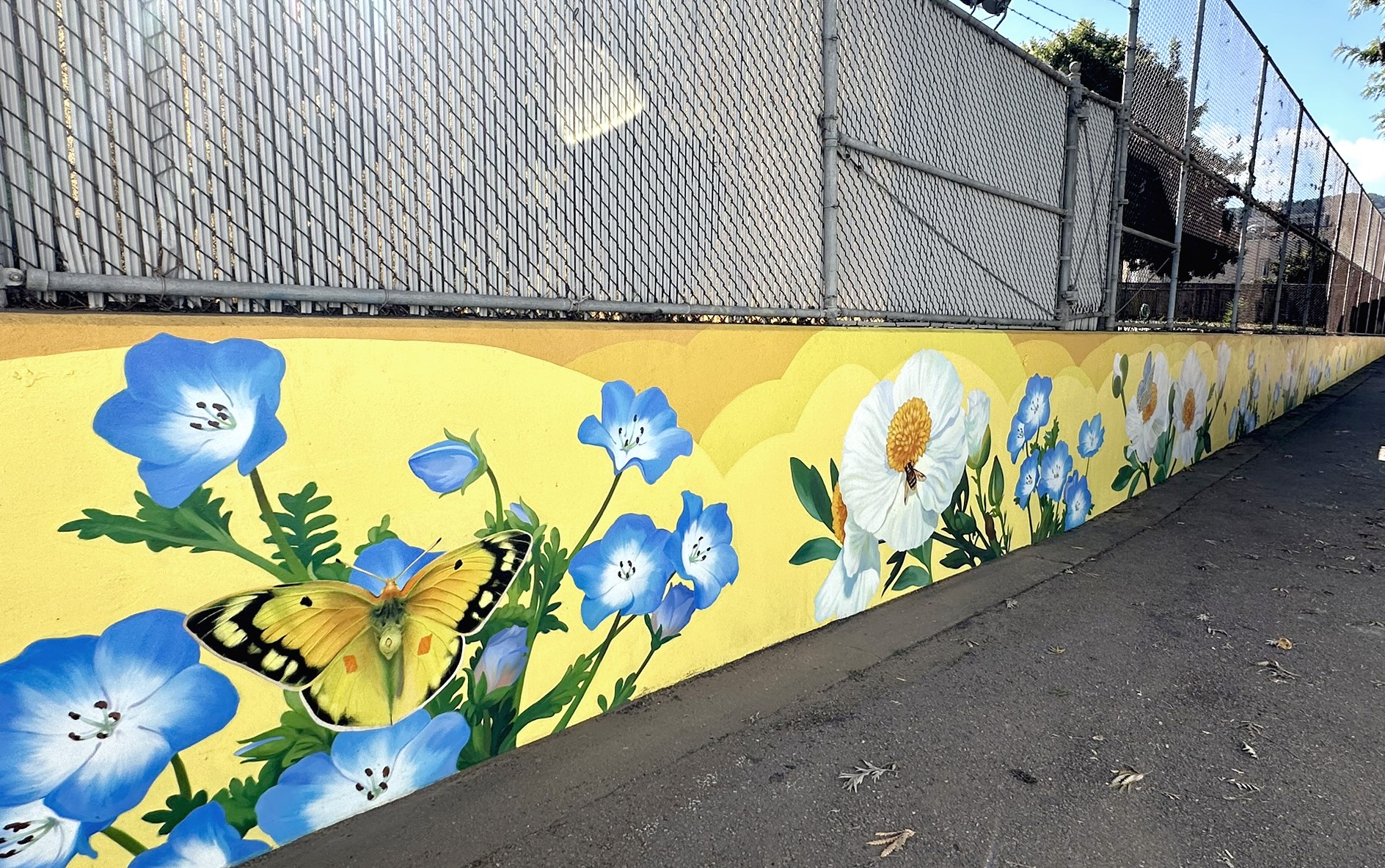 Yellow mural with flowers