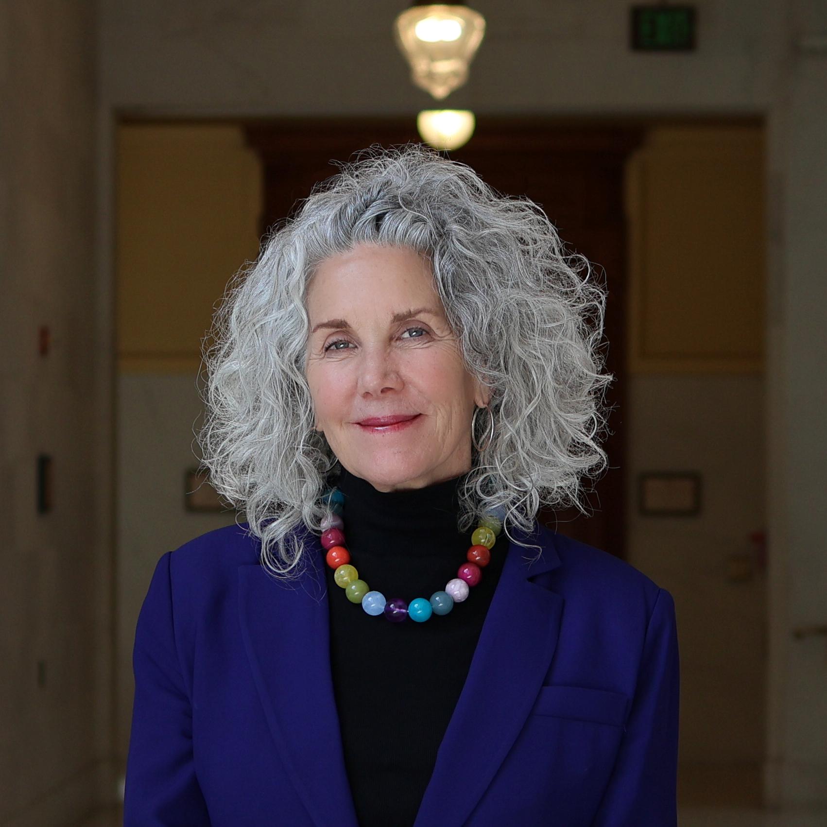 Headshot photo of Anne Taupier