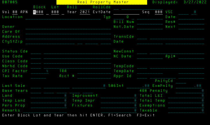 Photo of outdated assessment system with black screen and green font as an example of system the office is updating
