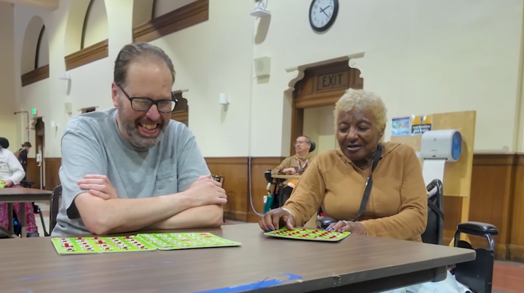 Two Laguna Honda residents playing BINGO