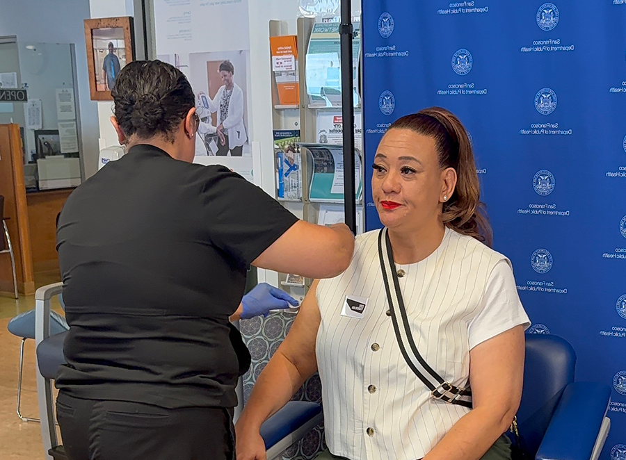 Woman getting vaccinated
