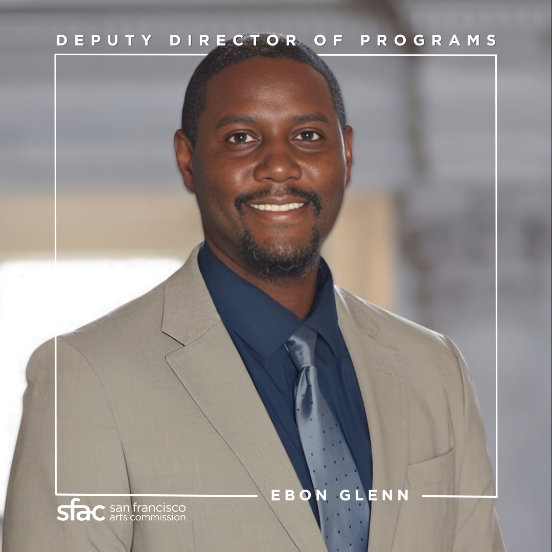 Portrait of a man in a suit and tie, labeled Ebon Glenn, Deputy Director of Programs at the San Francisco Arts Commission.