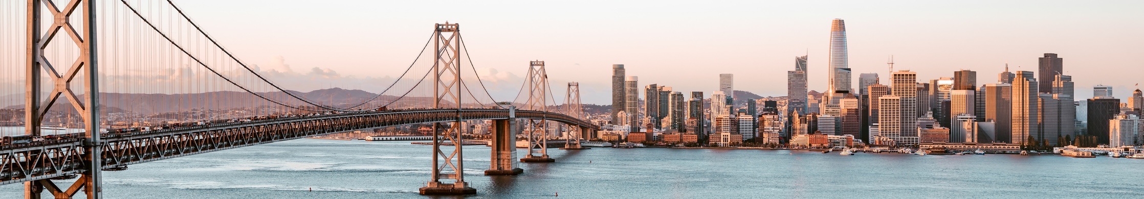San Francisco skyline and the Bay Bridge during sunrise