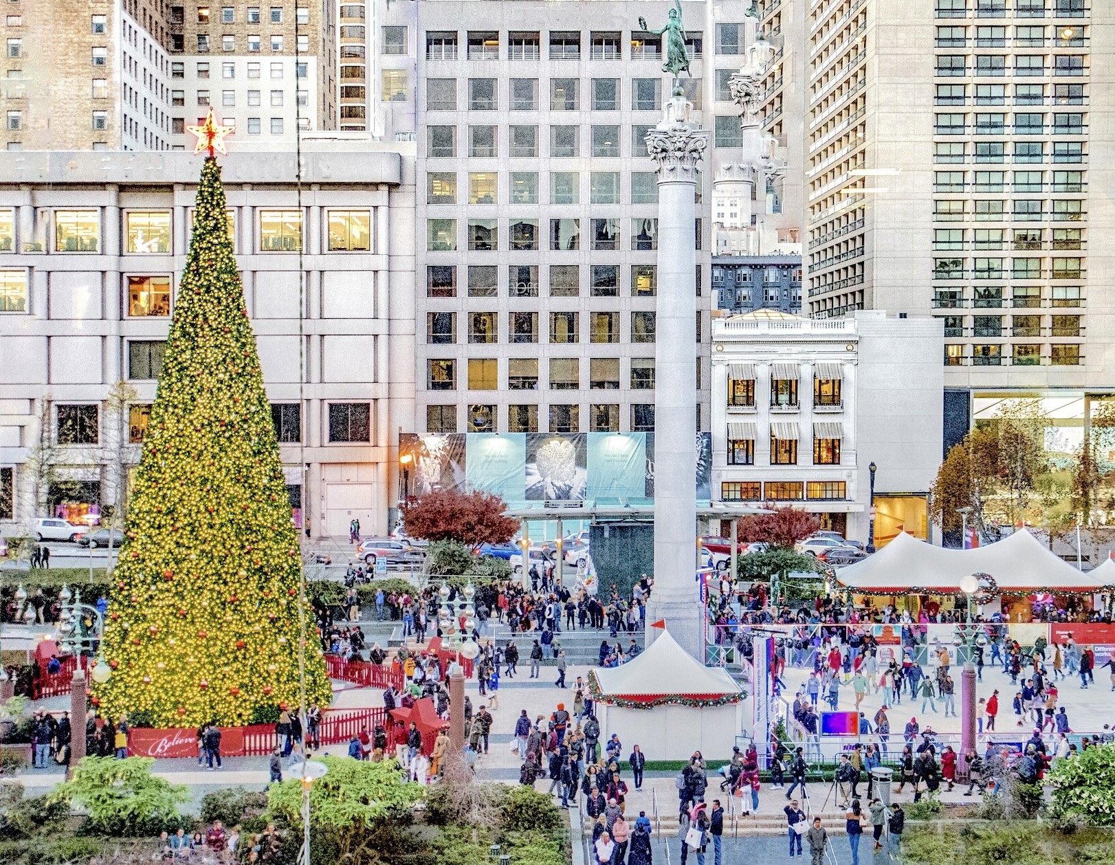 Christmas music, ice skating, and shopping happening at Union Square in San Francisco, California