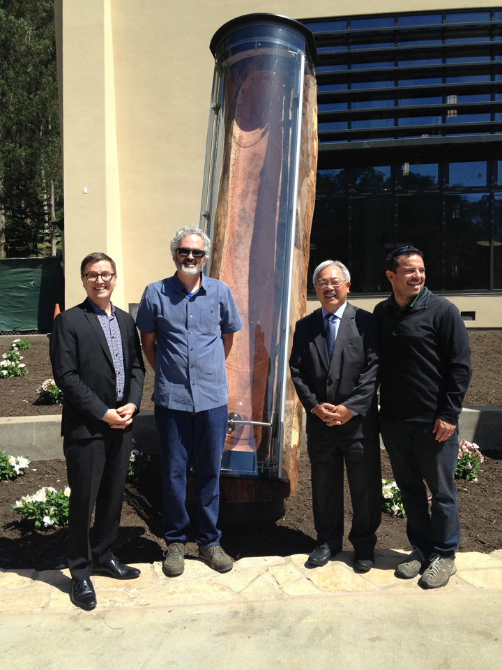 4 people standing in front of the art in glen park
