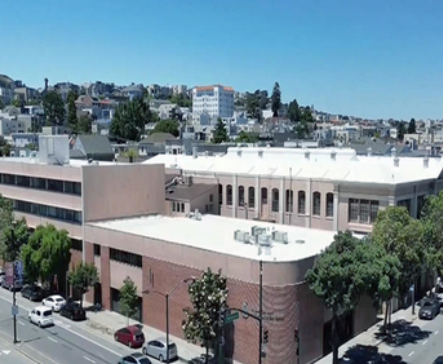 Brown and tan corner complex - the Joseph McFee Center is located here