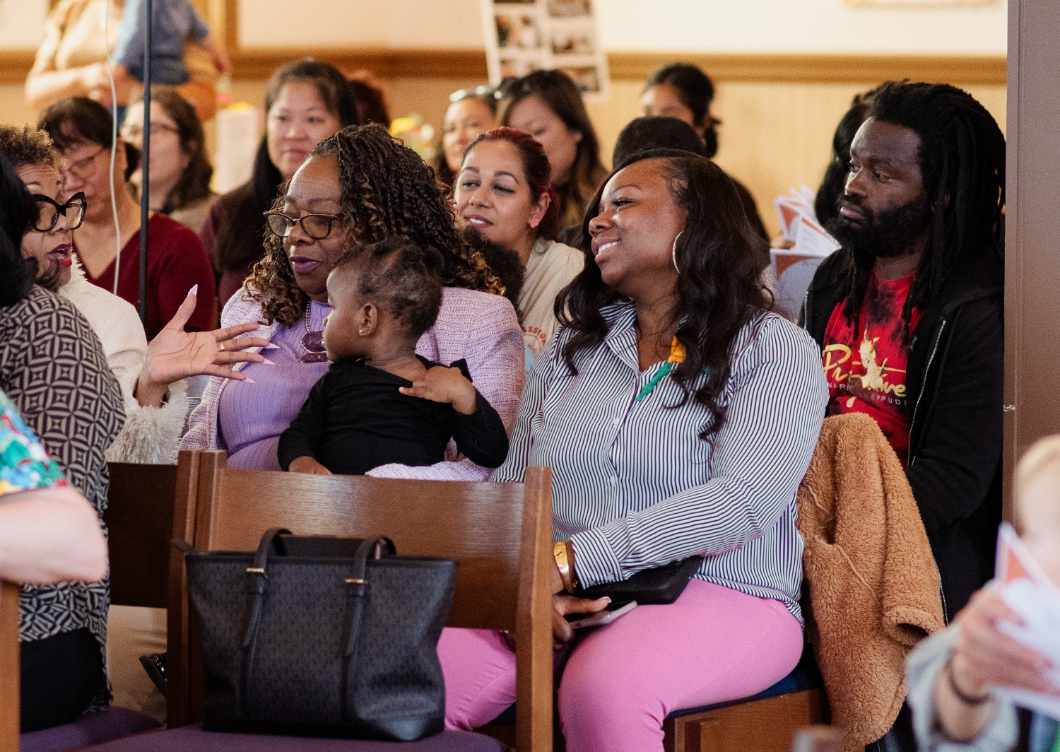 Photo of families with babies at a church event