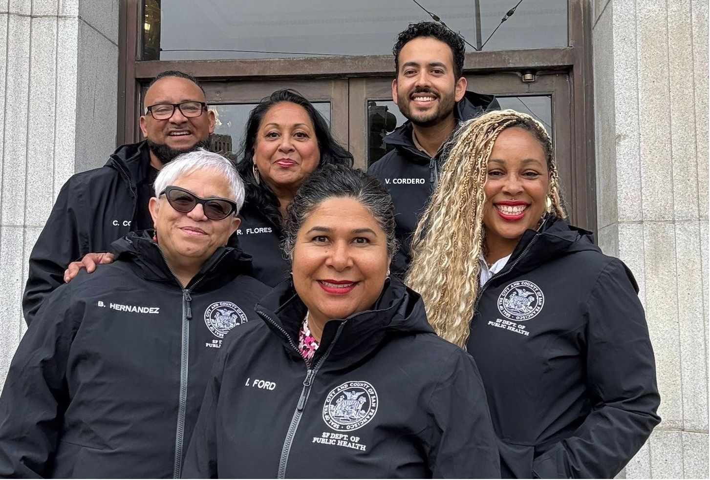 team photo taken in front of 101 Grove st.