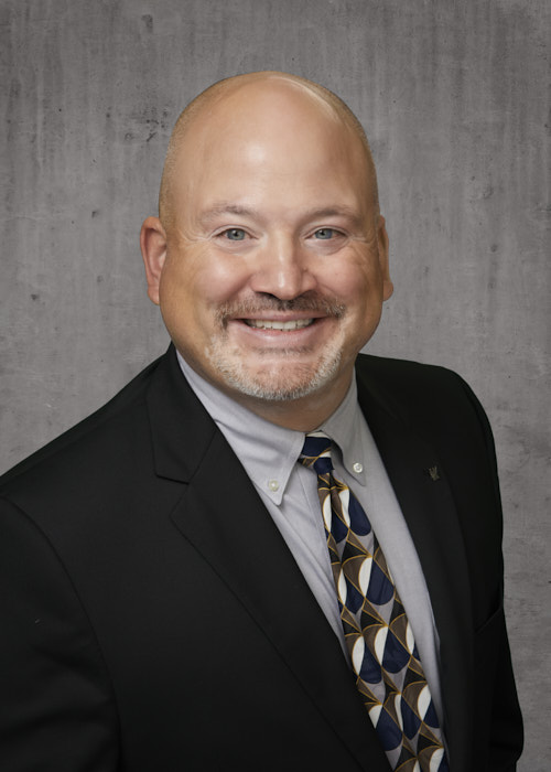 Headshot profile photo of Paul Hinz