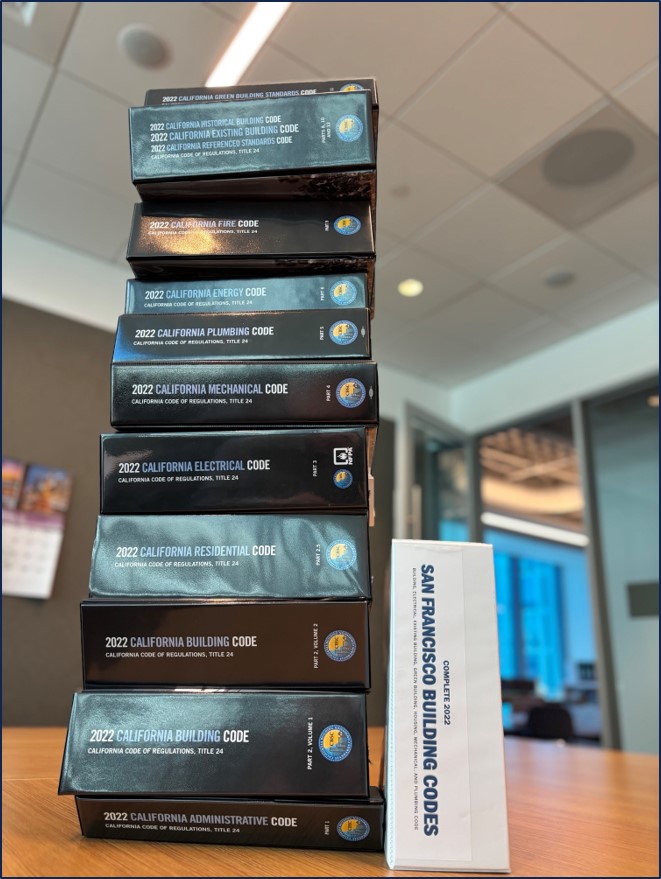 pile of building code books