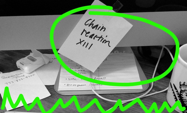 Sticky note on a montior reading Chain Reaction "XIII"