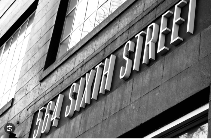 outside of the Community Assessment and Services Center(CASC). Shows a black and white image of the address which is 564 Sixth Street.