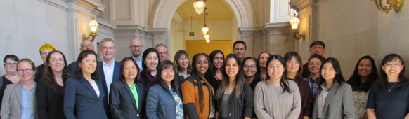 A group of people pose for a picture.