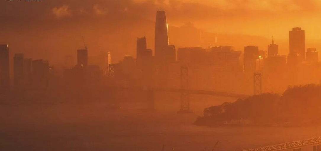 City skyline with red sky