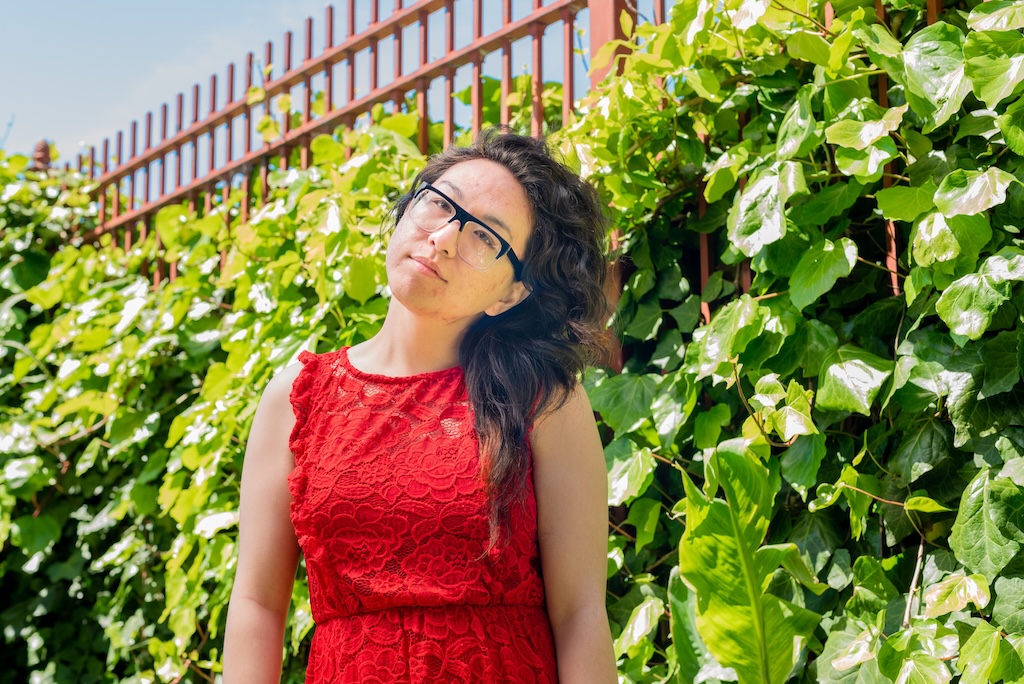 Trans woman wearing red dress
