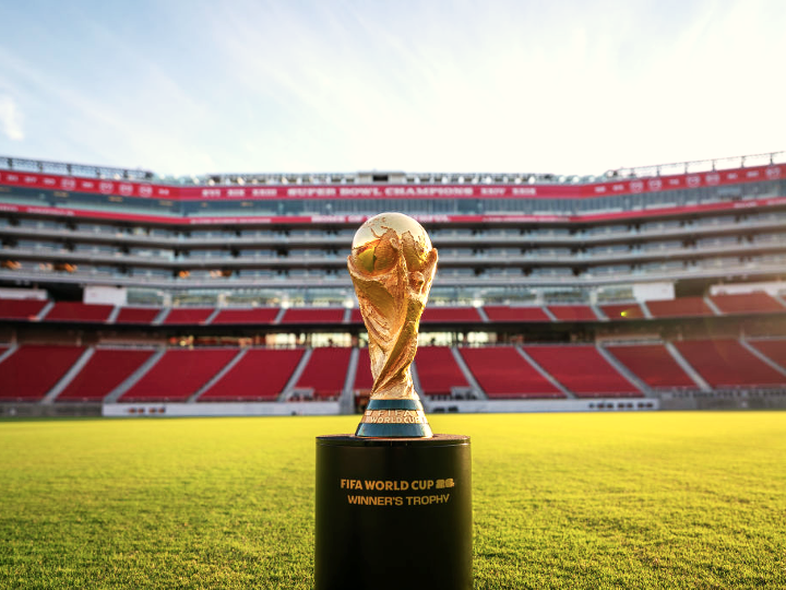 The FIFA World Cup trophy sitting on the pitch at Levi's Stadium in Santa Clara