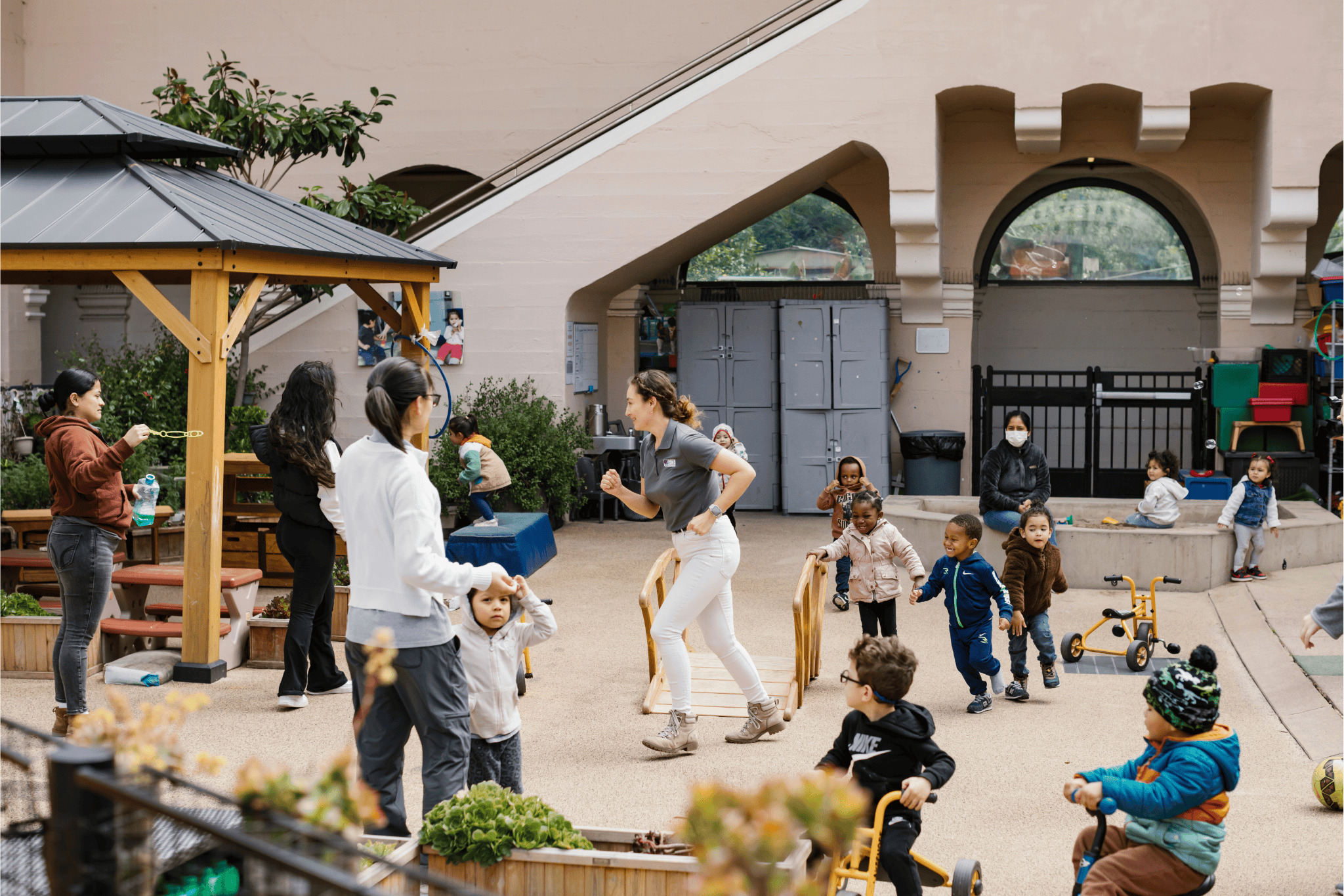 Child care worker playing with kids