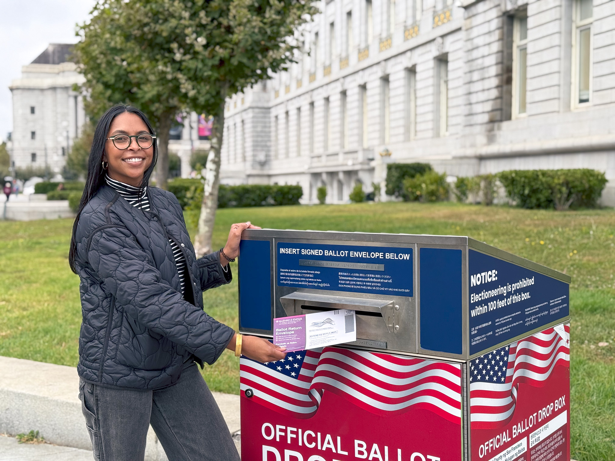 San Francisco voter dropping off their ballot at an official ballot dropbox
