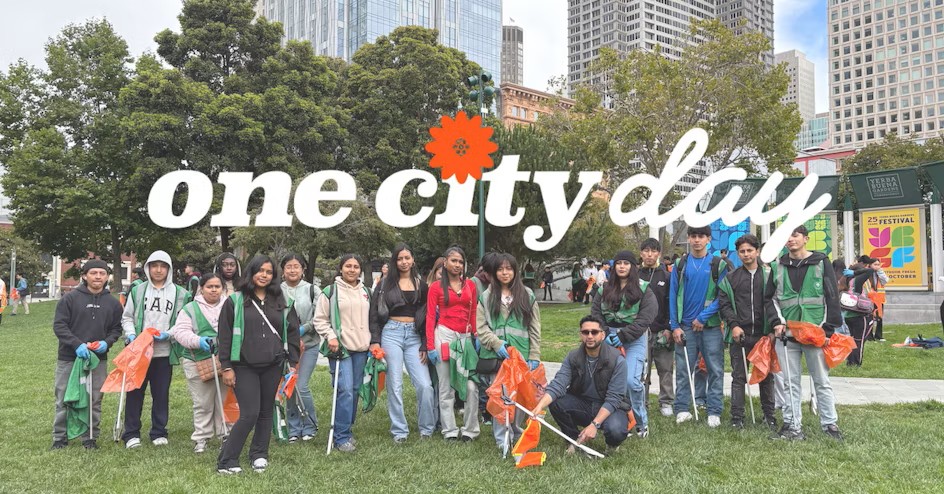 Cleanup crew with One City Day overlay