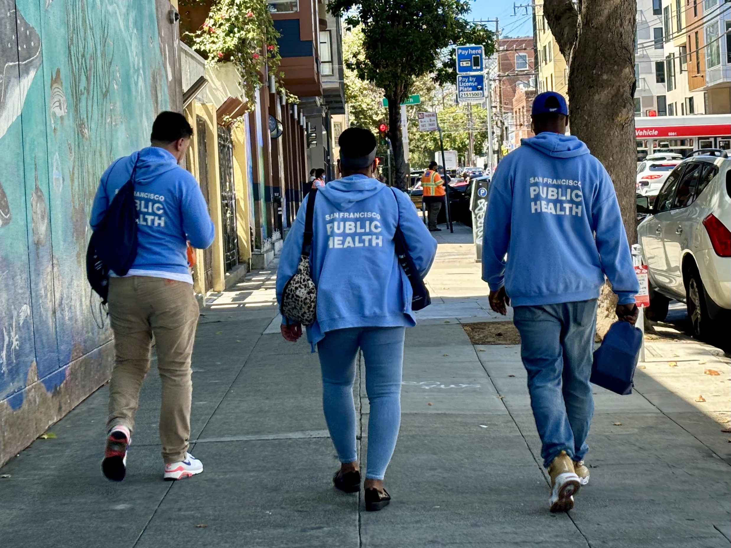Street Team Health Workers walking on the street