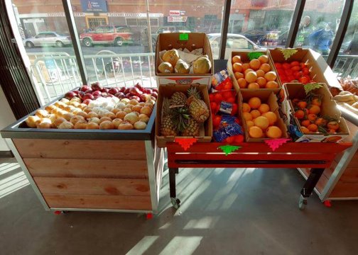 photo showing conversion of a cornerstone selling fresh fruits and vegetables