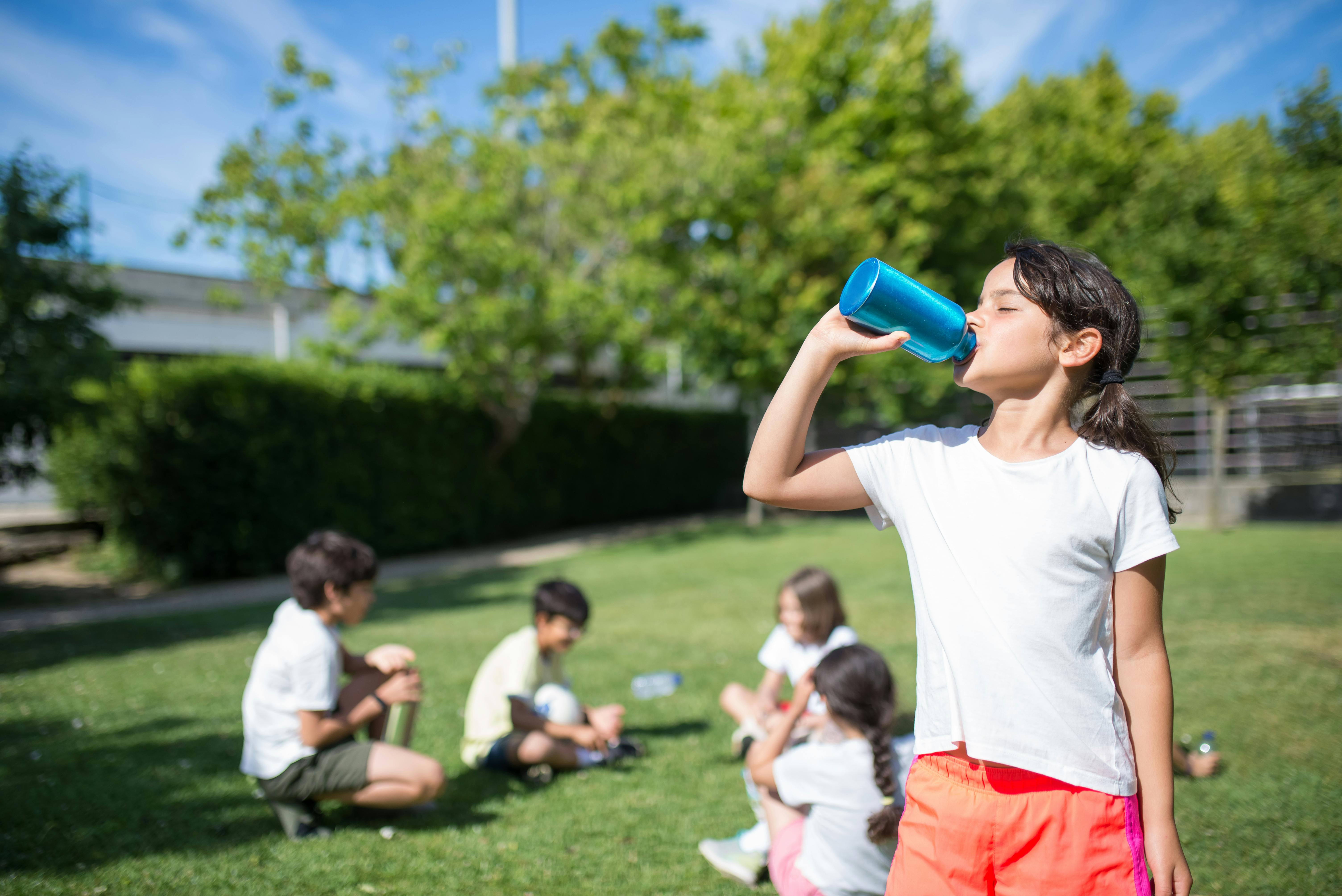 Youth drinking from bottle