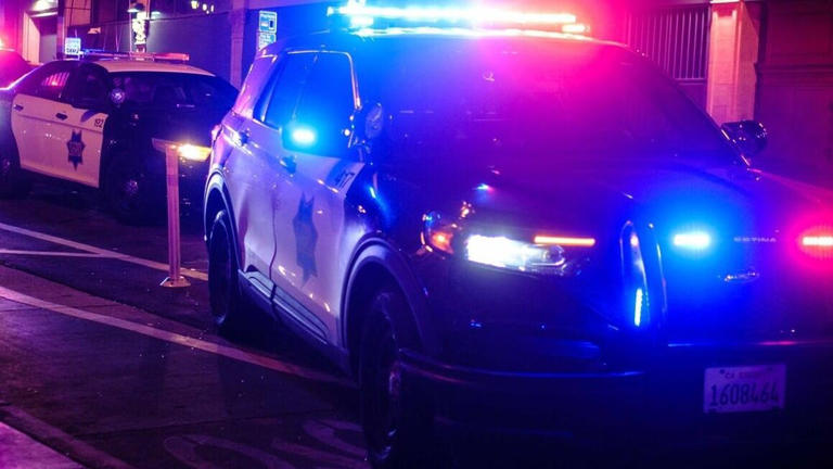 Multiple police cars driving