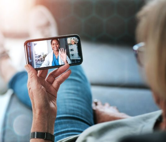 person having video visit with doctor on phone